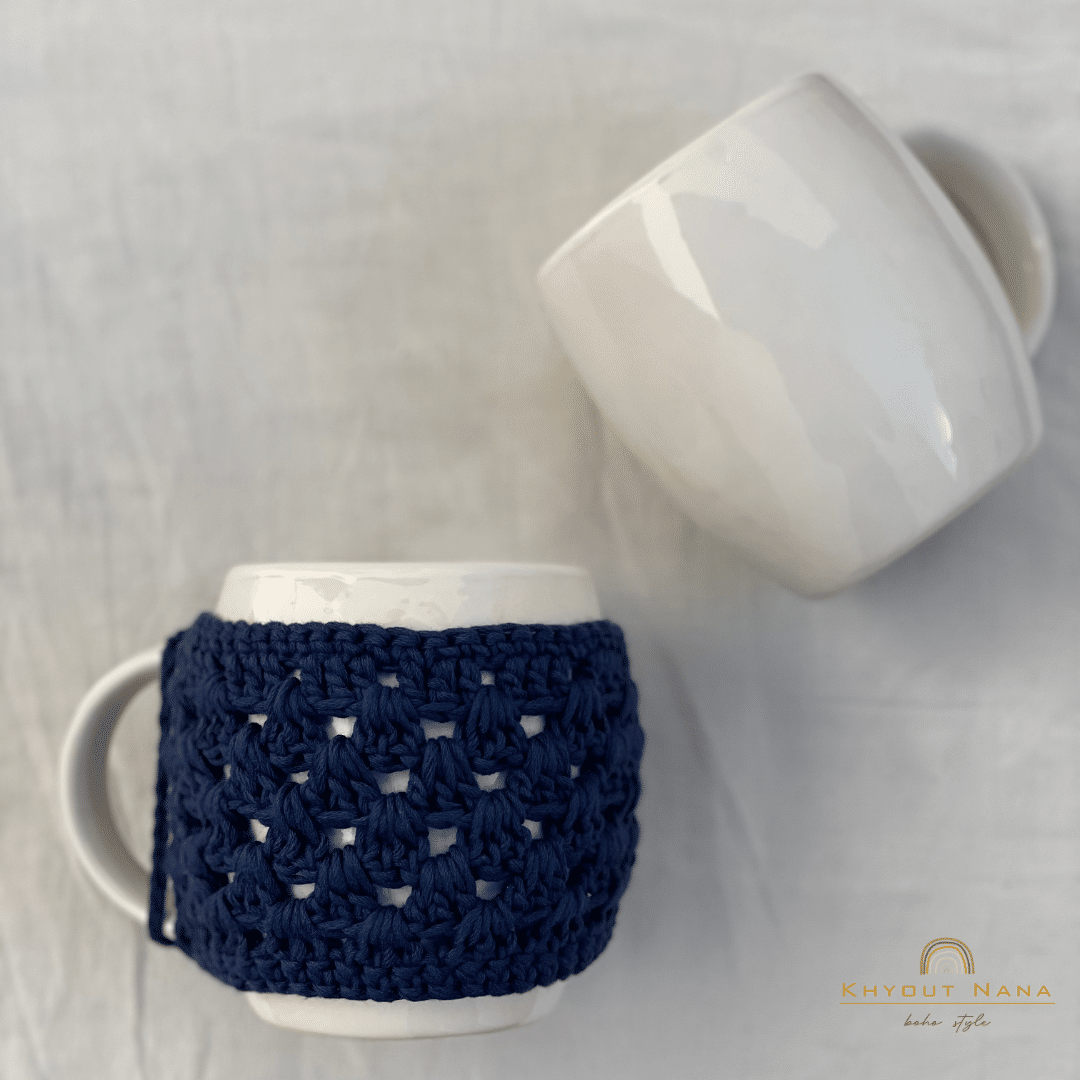Mug with multi-colored crochet mug cover
