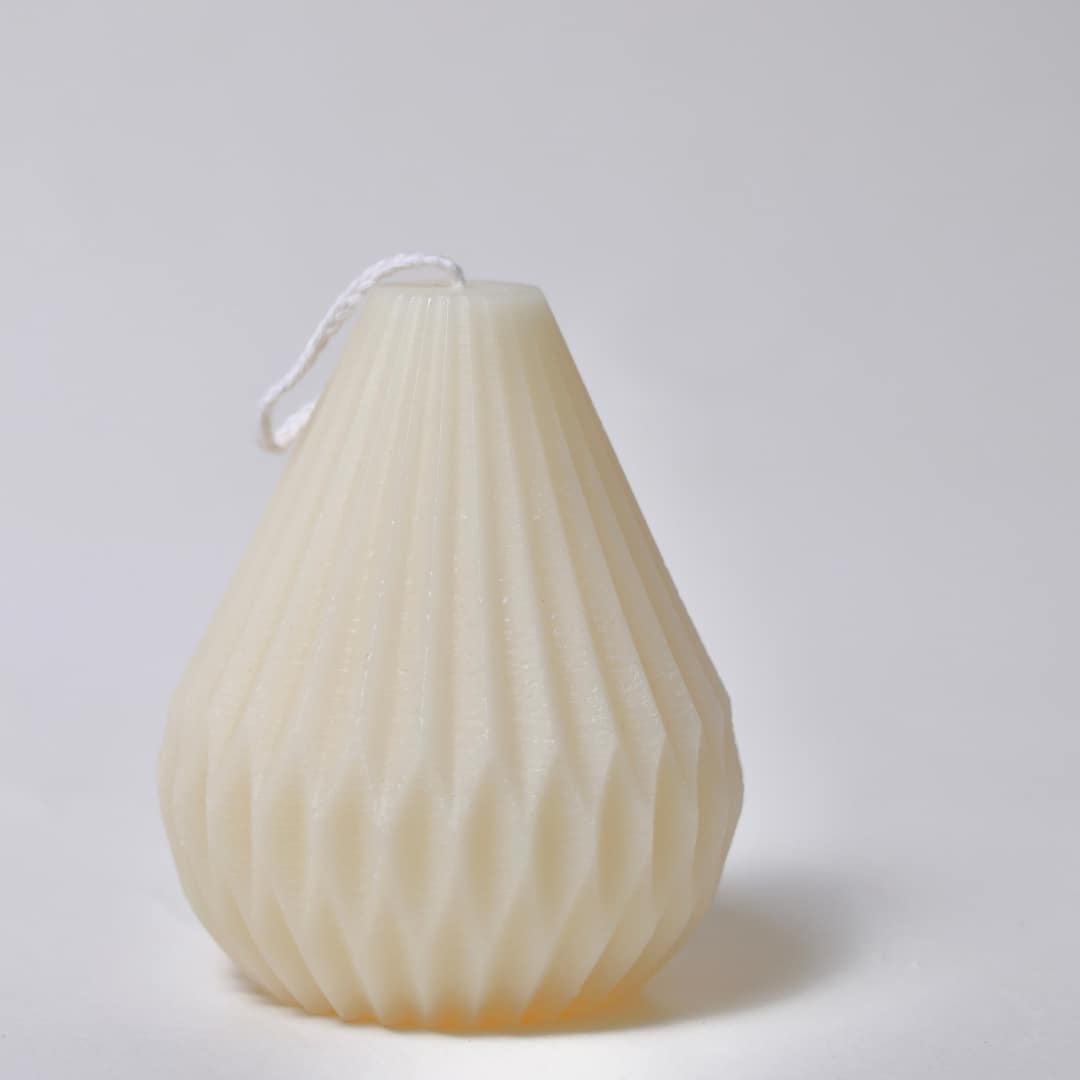 Natural pear-shaped candle