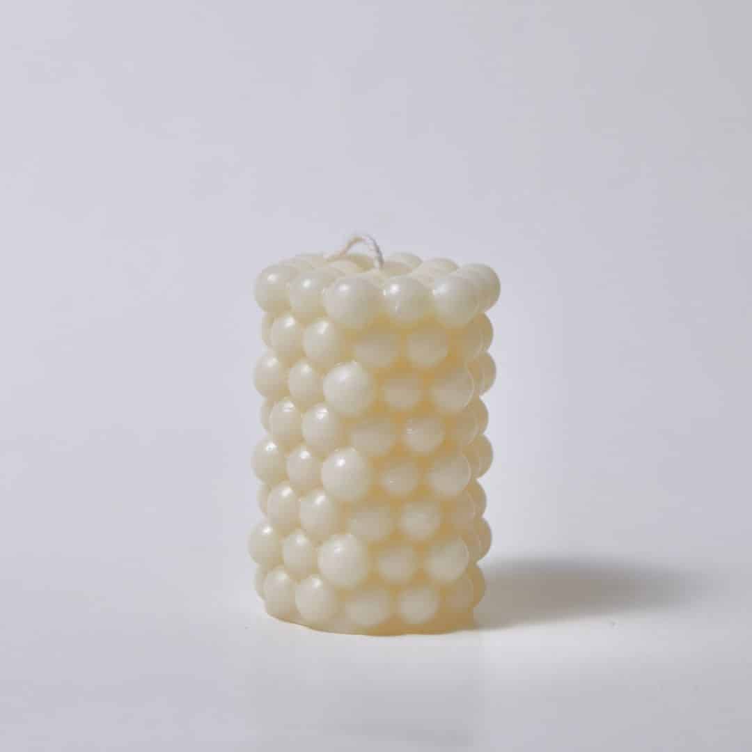 Natural pearl-shaped candle