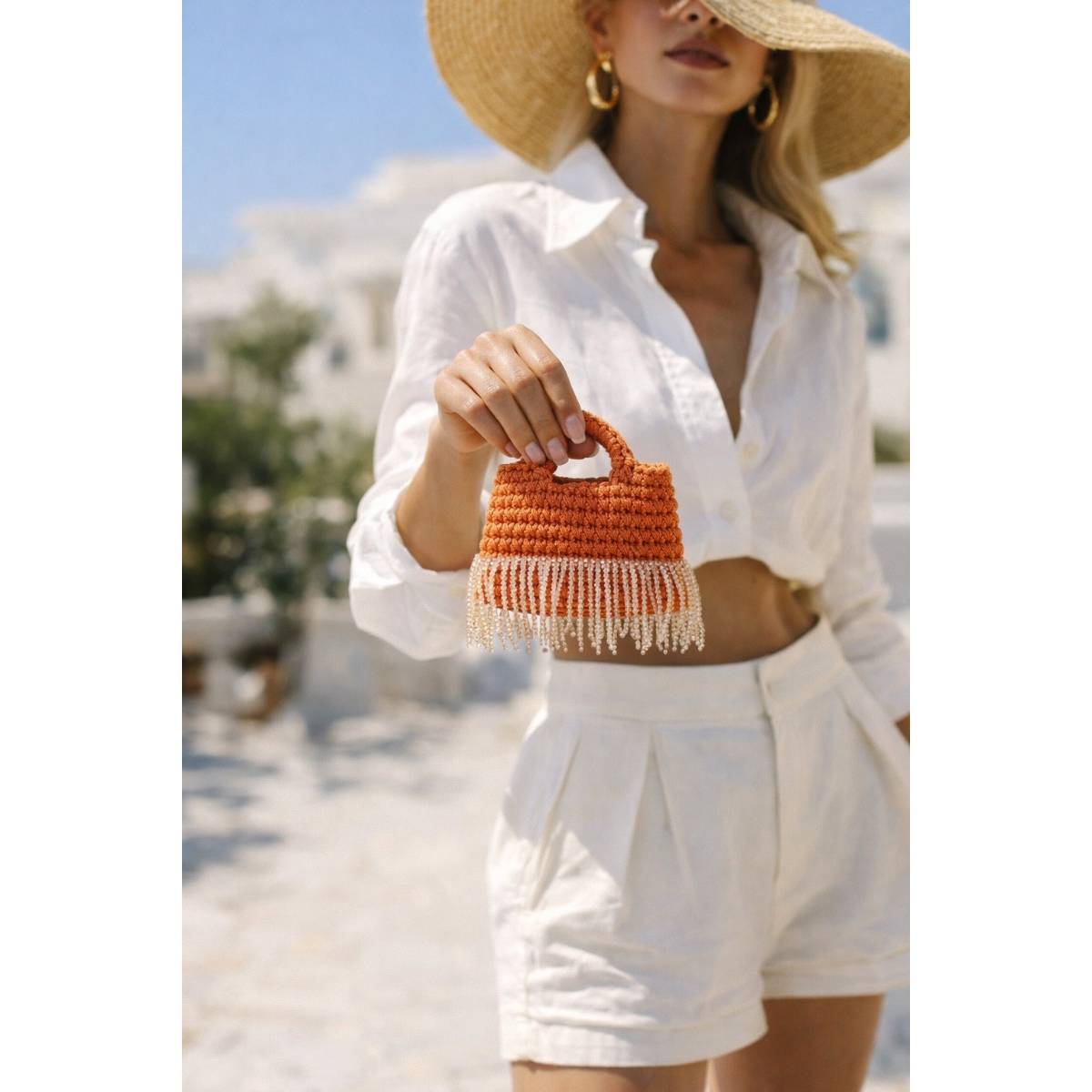 Sac bandoulière orange tissé main - éclat art — angle supp. Produit artisanal.