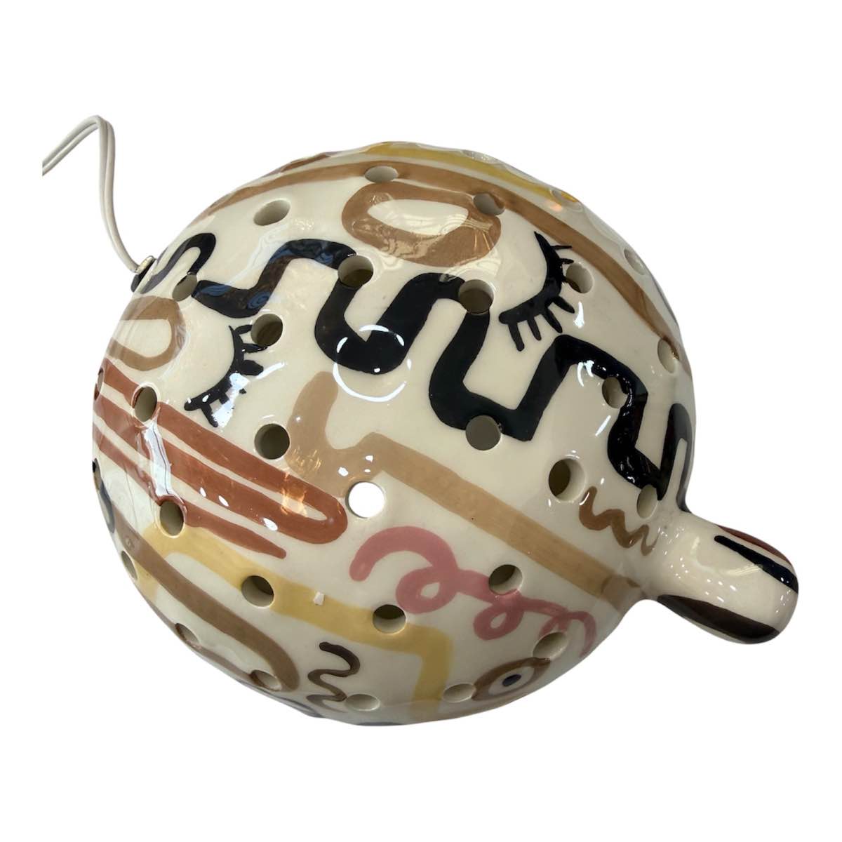 lampe tortue céramique élégante en tons pastels pour votre déco
