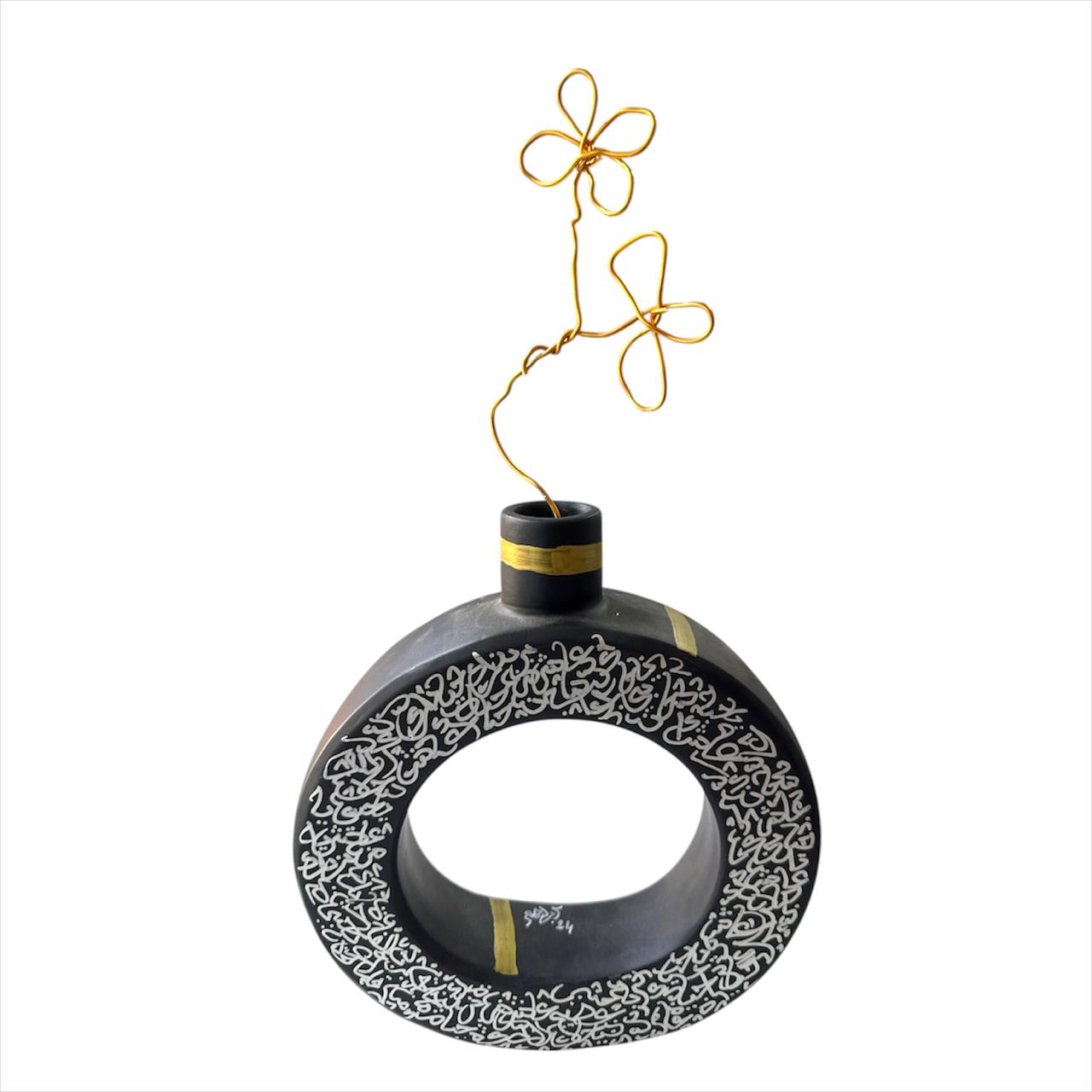 Vase soliflore en calligraphie et sa fleur