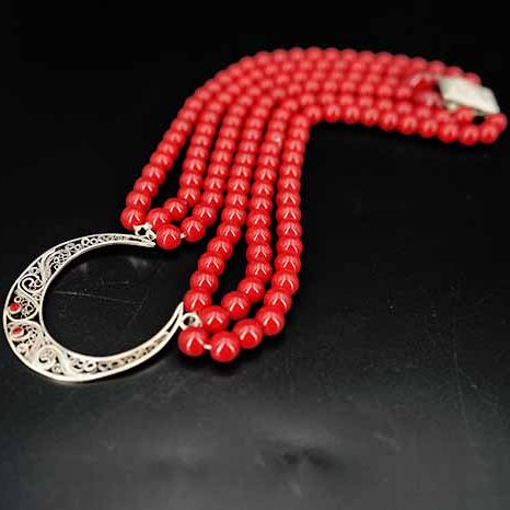 Handmade filigree silver necklace with fine hinge and red cubic zirconia