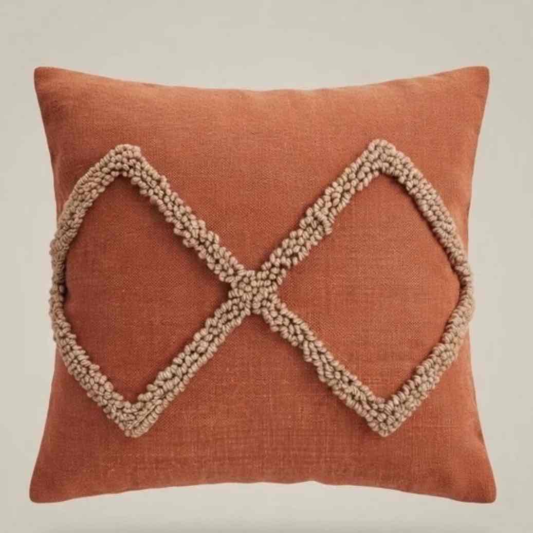 Coussin terracotta brodé à la main 40x40cm pour un style unique