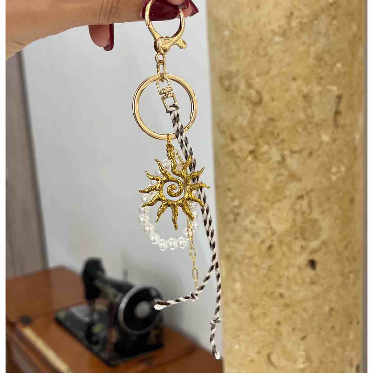 Porteclé soleil design exclusif pour illuminer vos clés