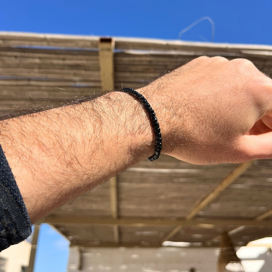 Bracelet en perles noires unisexe