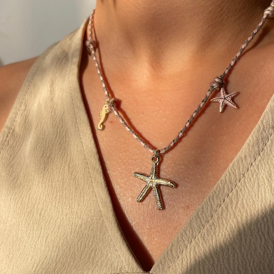 collier étoile de mer dorée chic sur cordon tressé artisanale
