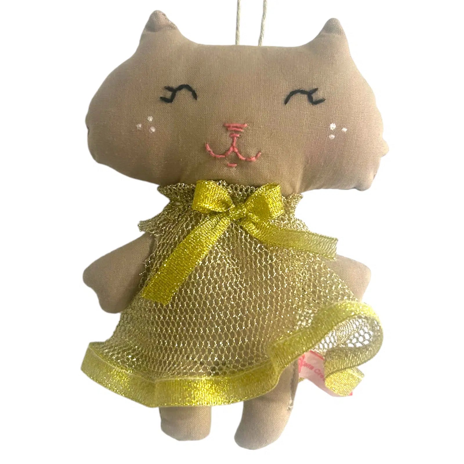 Doudou chat en robe dorée un compagnon tendre et élégant