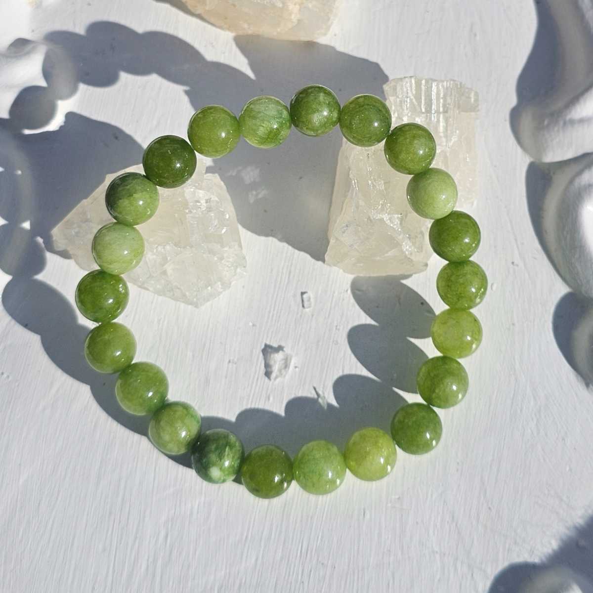 Bracelet péridot élastique en boules de 6 mm pour briller