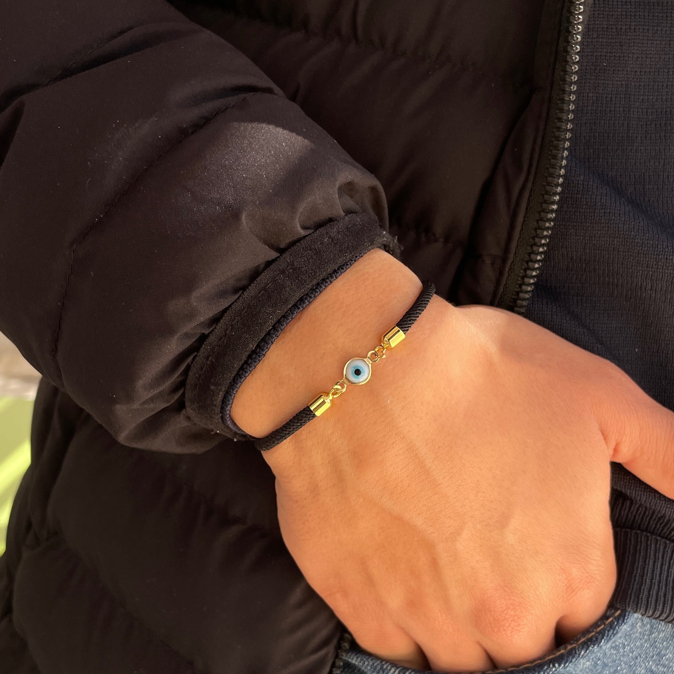 Bracelet petit oeil avec cordon noir ajustable unisexe