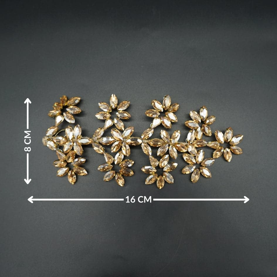 Accessoire de cheveux doré avec cristaux en forme de fleurs