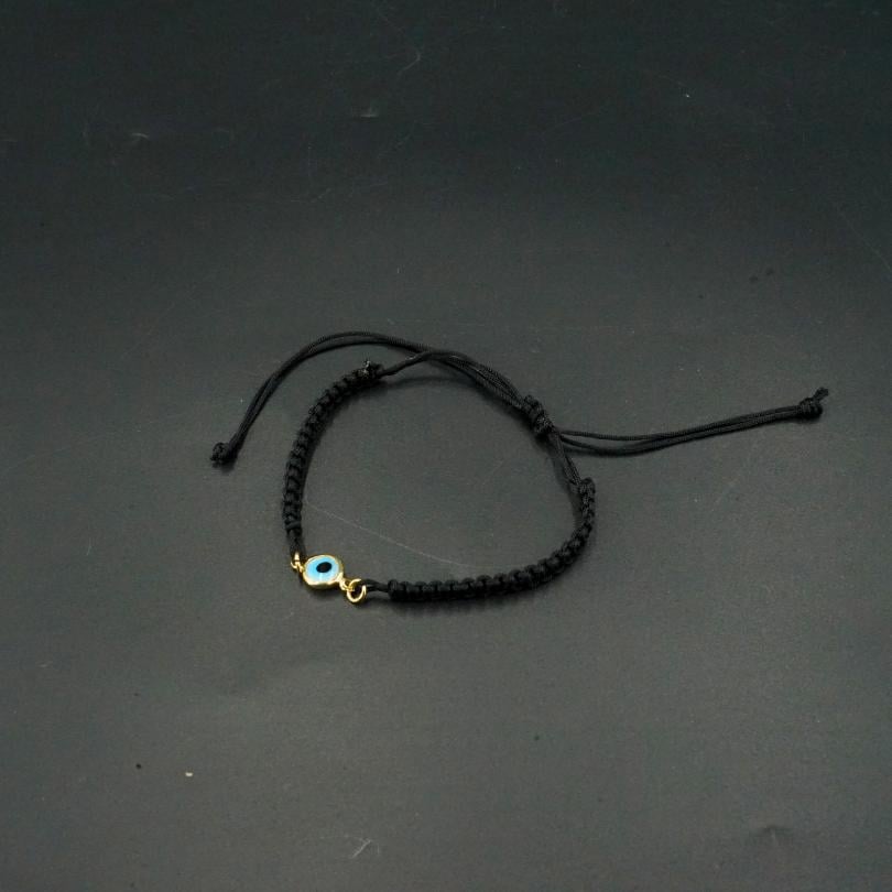 Bracelet "œil bleu" fait main en coudre noir