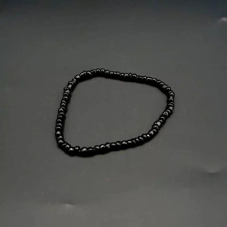 Bracelet en perles noires unisexe