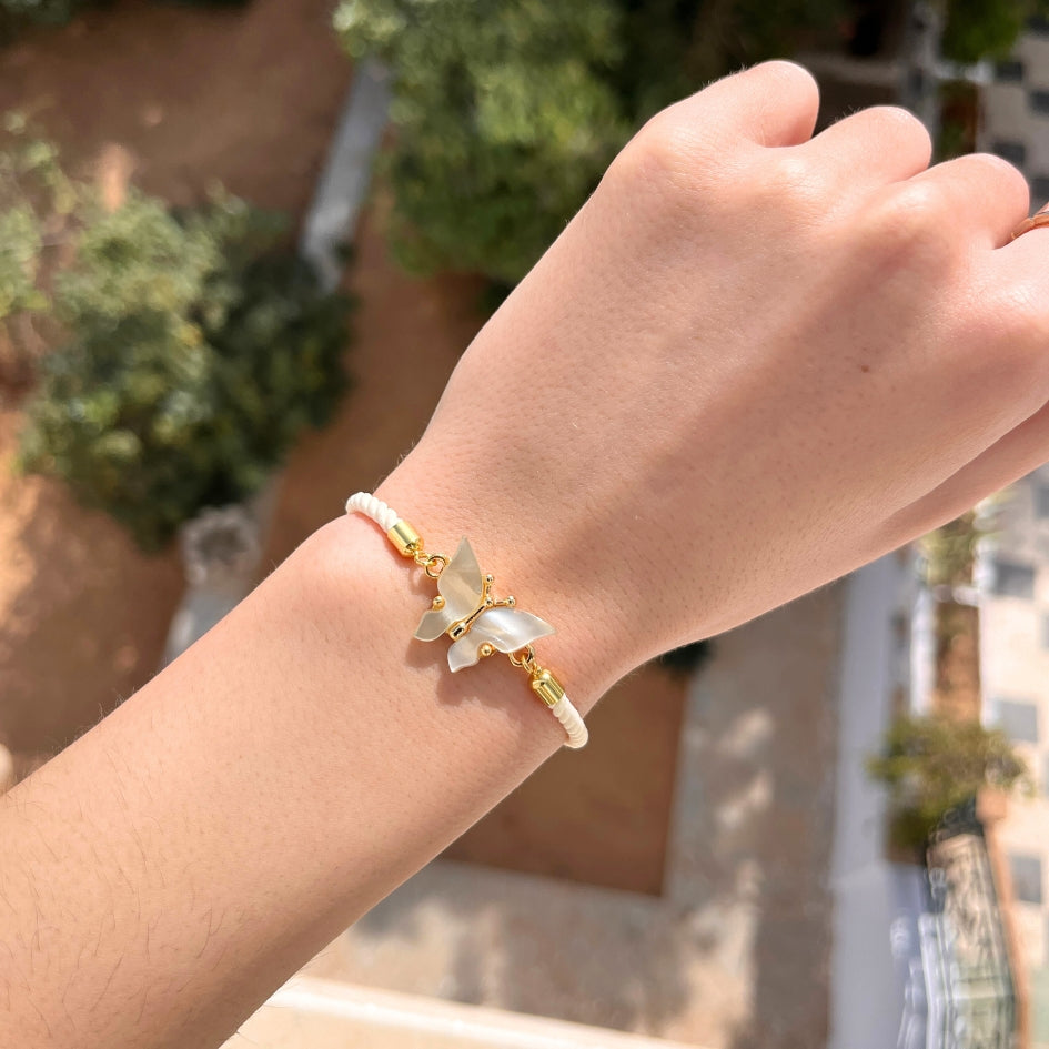 Bracelet papillon blanc et doré
