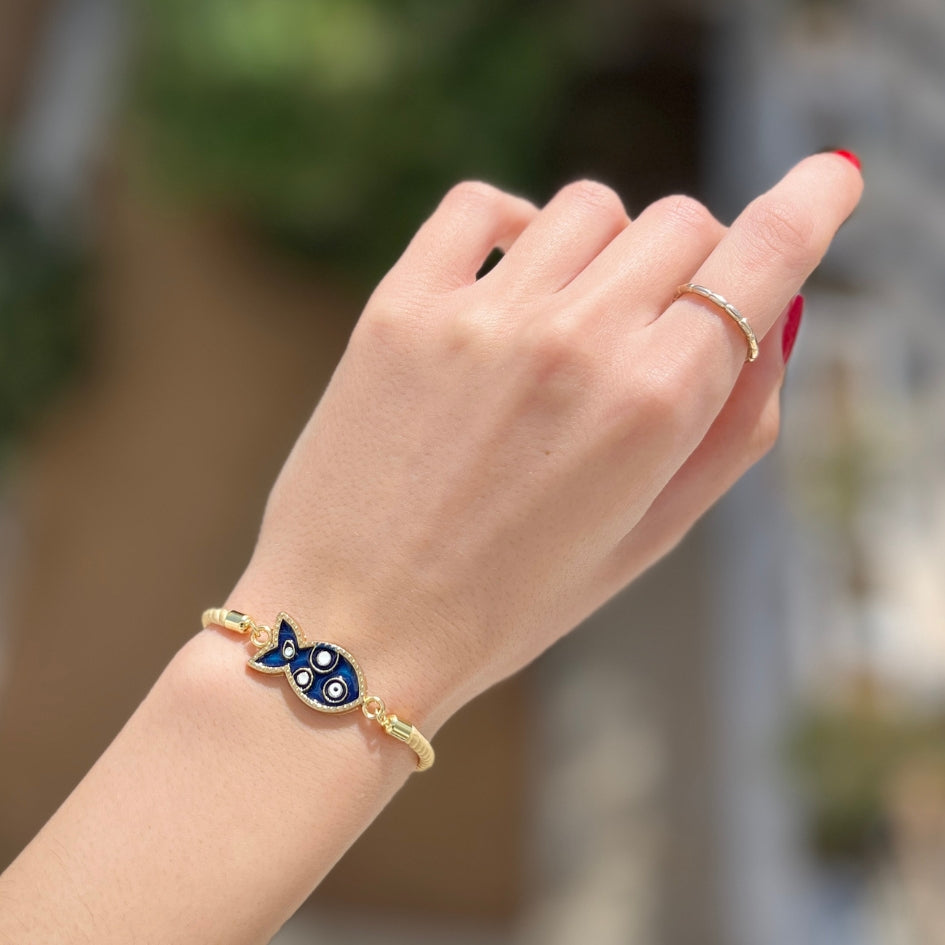 Bracelet poisson doré et bleu avec œil protecteur