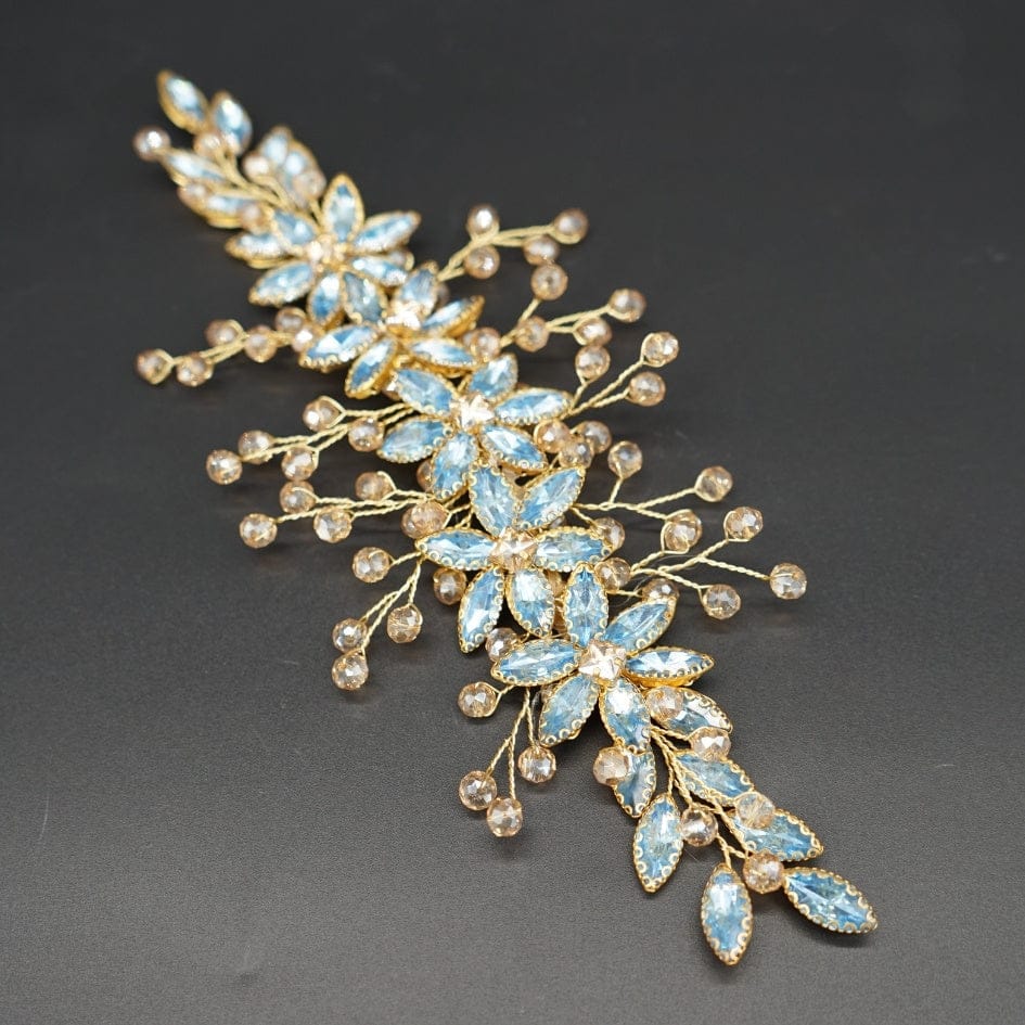 Broche à cheveux fleurs bleu ciel en cristaux