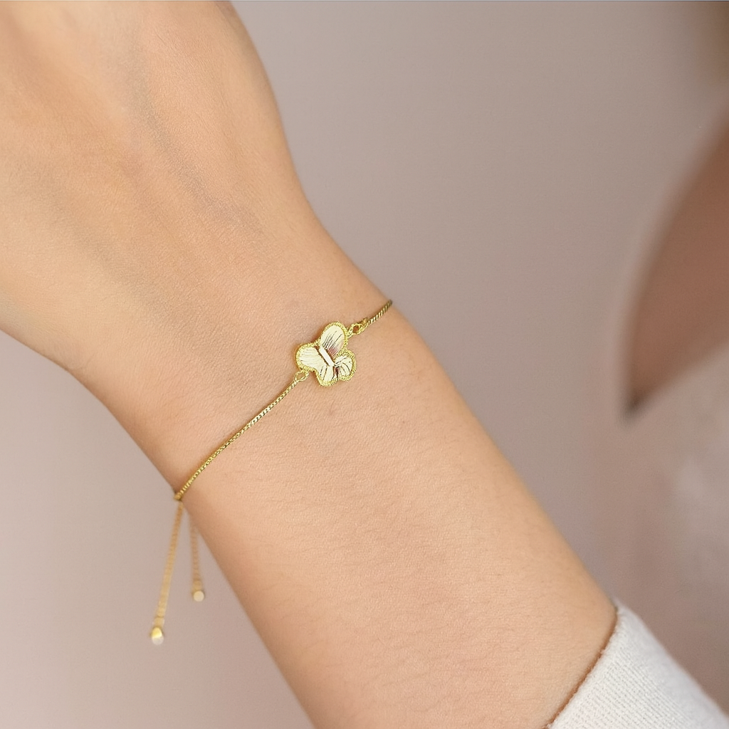 Bracelet ajustable en acier inoxydable avec motif papillon doré