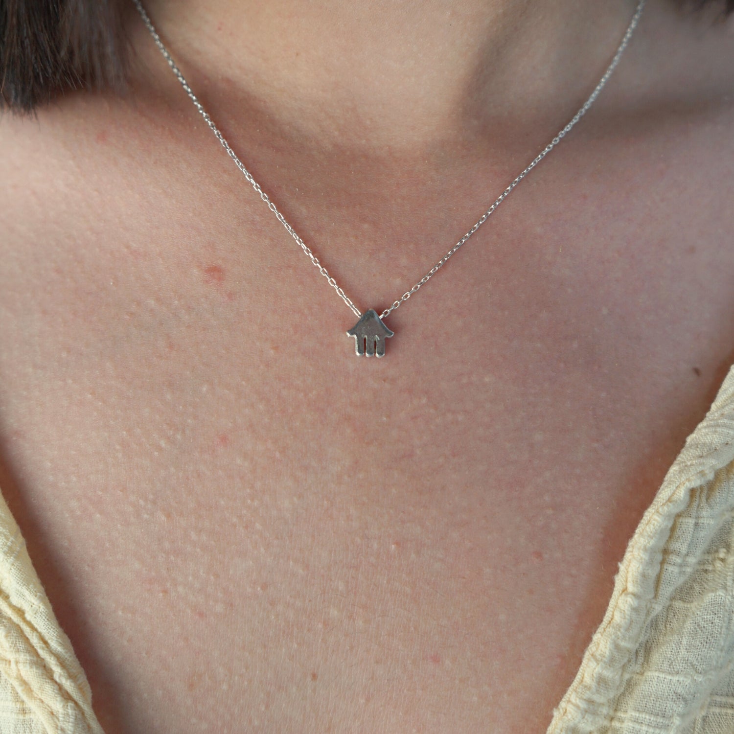 Collier argent artisanal : Élégance unique à porter