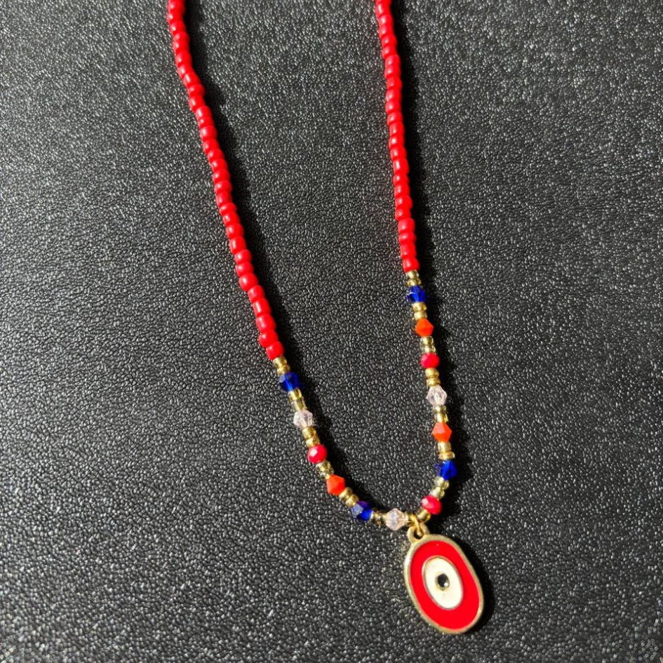 Collier rouge fait main – Élégant et unique avec pendentif œil