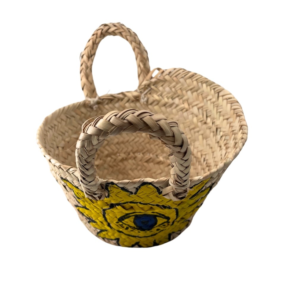 Couffin traditionnel en fibre de palmier naturelle avec peinture jaune