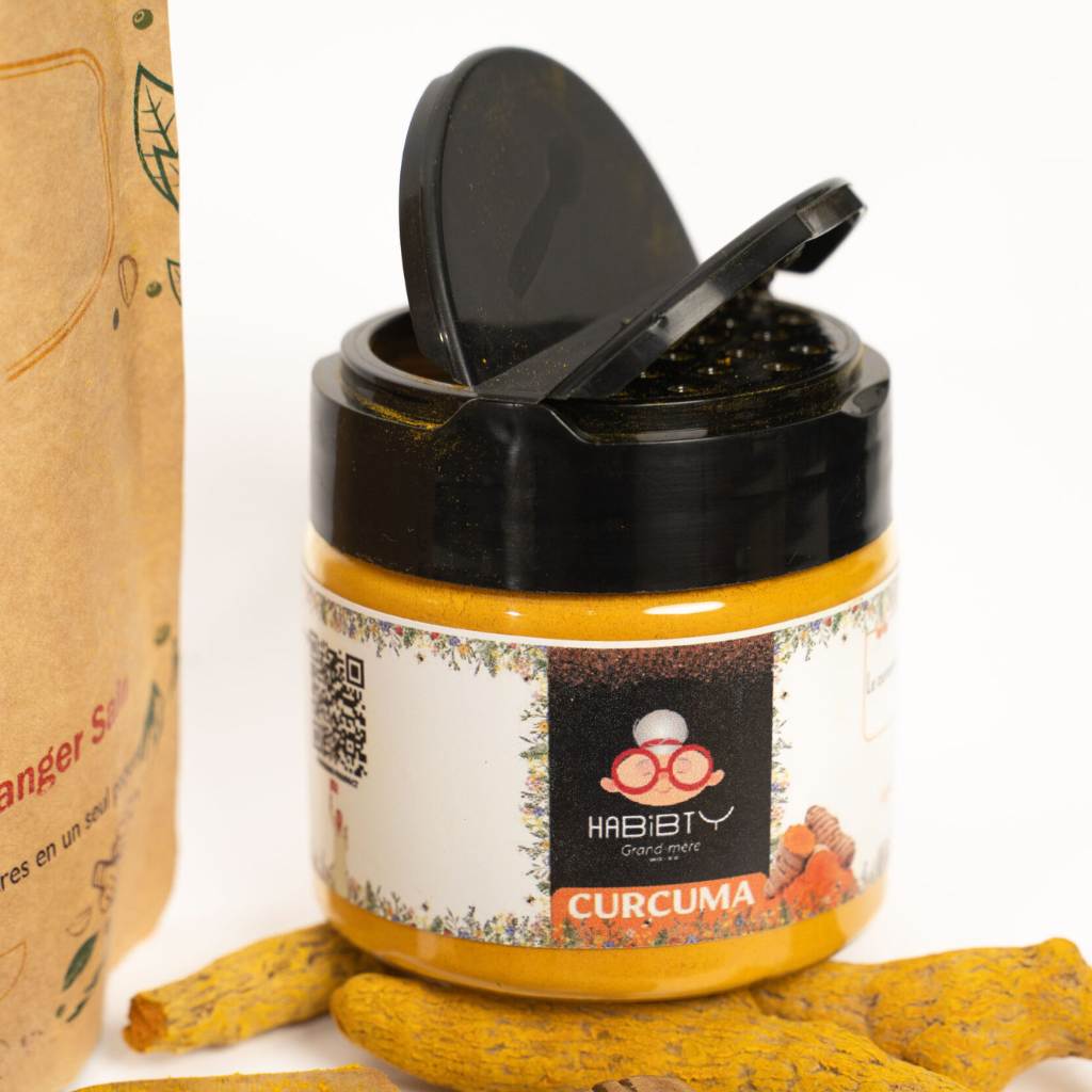 Ground turmeric in jar with lid