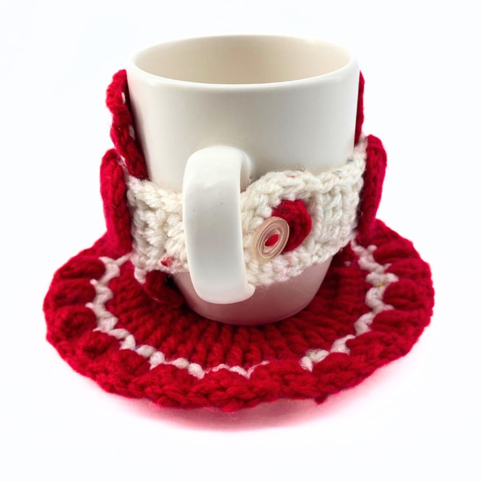 Mug cosy en crochet couleur rouge avec sous-tasse