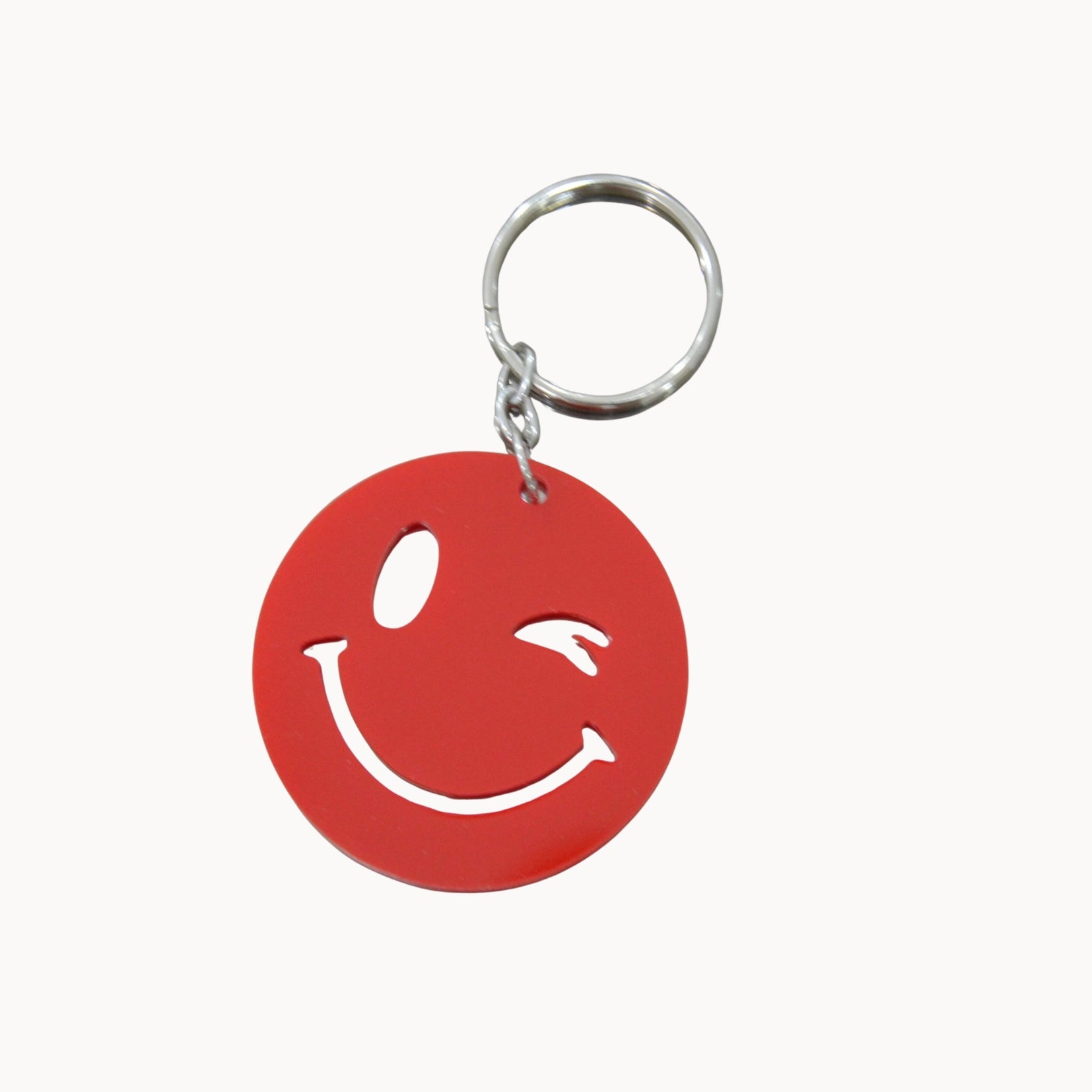 Porte clé smiley clin d’œil en acrylique coloré