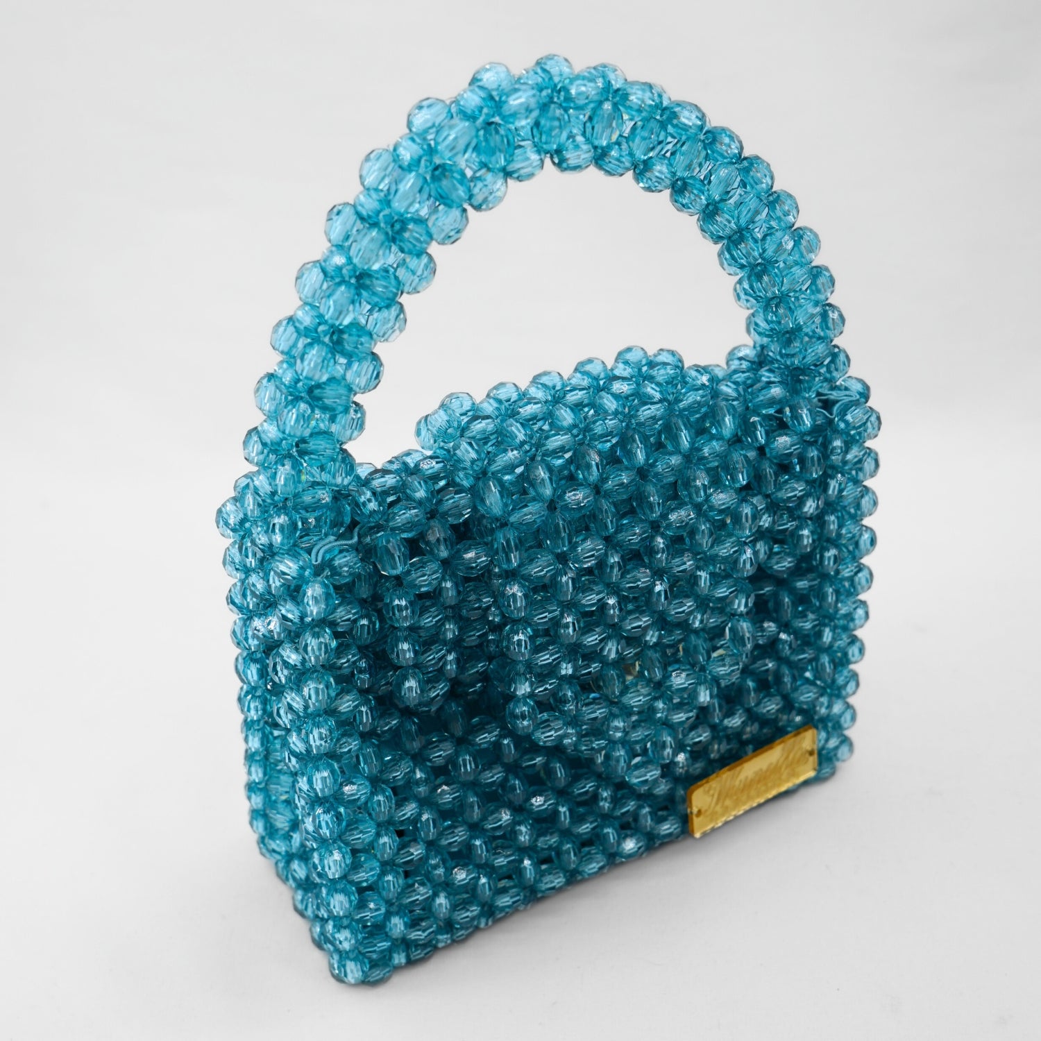Sac perles bleu chic : l'élégance exclusive à portée de main