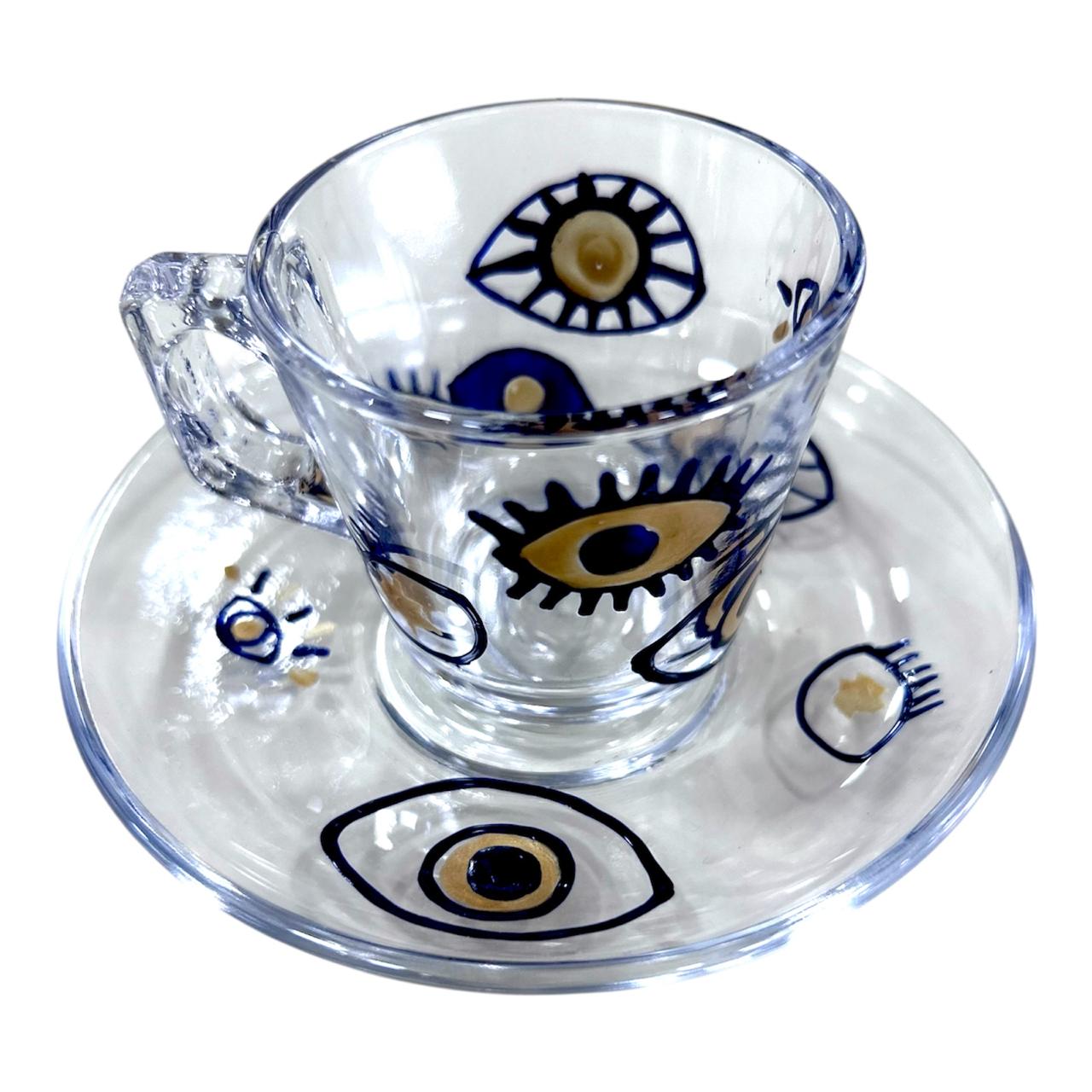 Un coffret bleu composé de Tasse et sous-tasse en verre - Motif Oeil