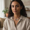 Collier perles élégant avec motif oeil pour un style unique