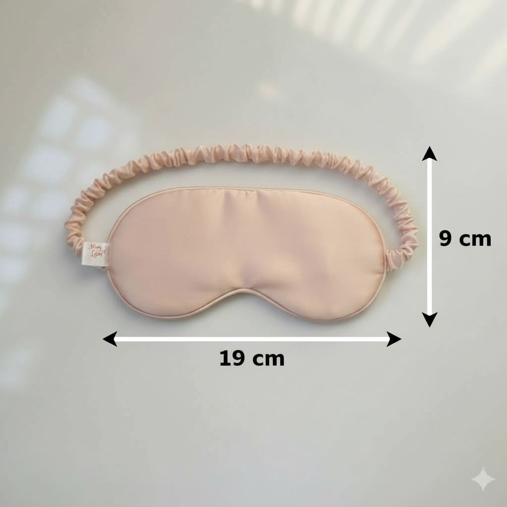 masque de sommeil satin luxe Peche rosé bebe clair pour un repos parfait