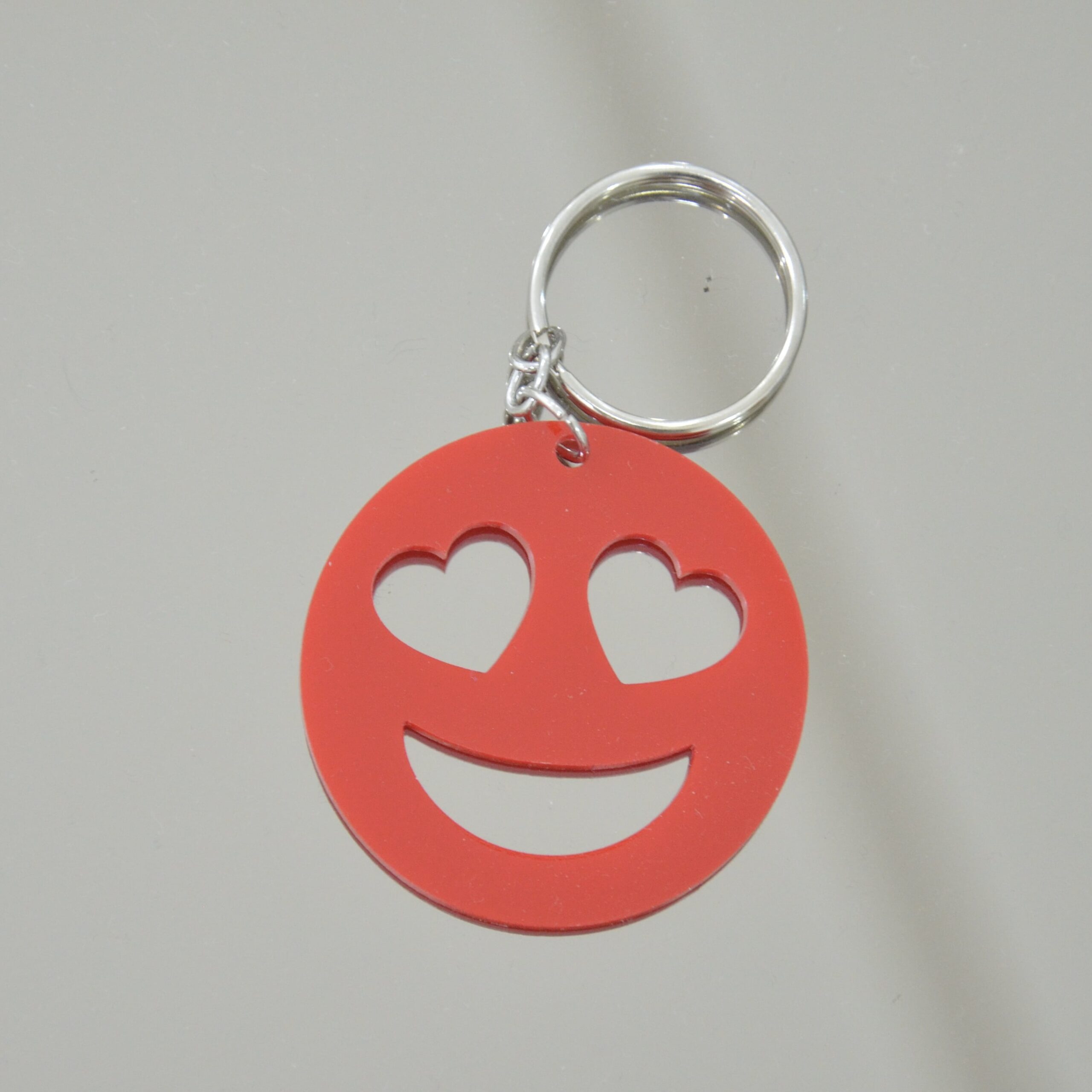 Porteclé Smiley : Un Accessoire Fun en Acrylique Irresistible