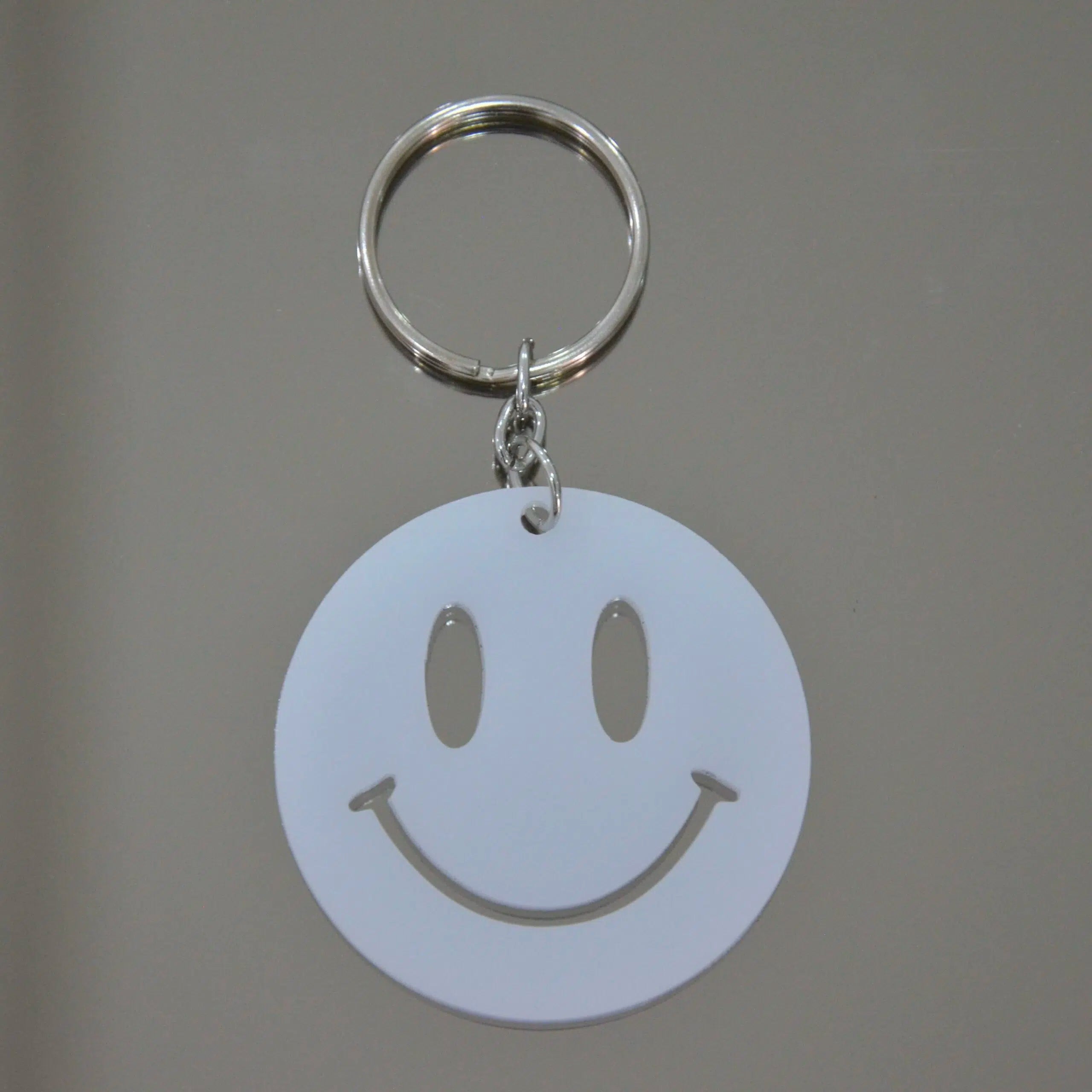 Porteclé smiley : l'accessoire fun et premium à ne pas manquer