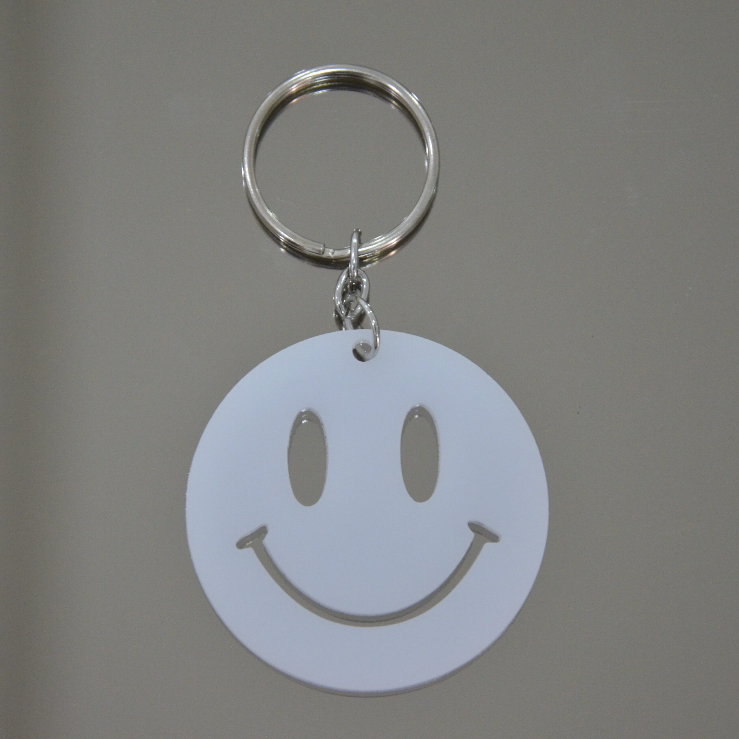 Porteclé smiley : l'accessoire fun et premium à ne pas manquer