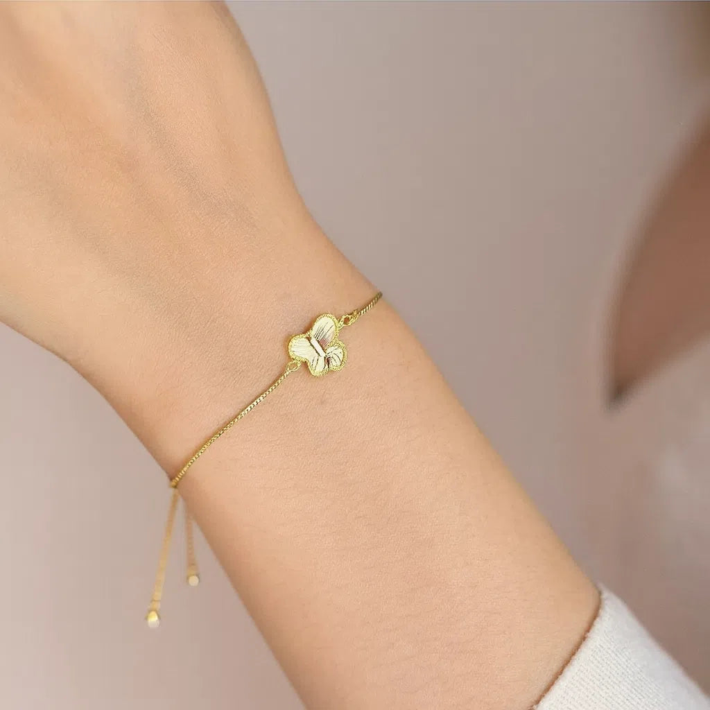 Bracelet ajustable en acier inoxydable avec motif papillon doré