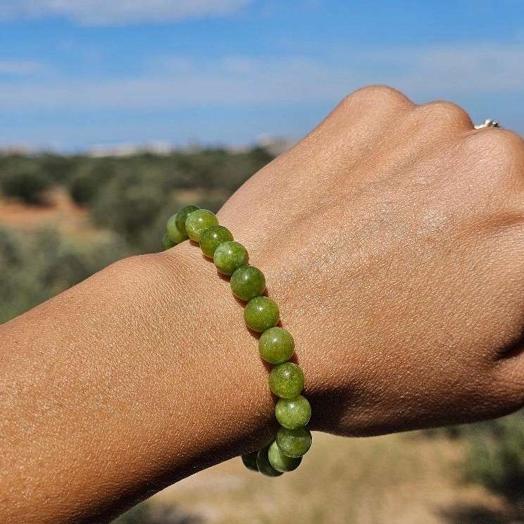 Bracelet péridot élastique en boules de 6 mm pour briller