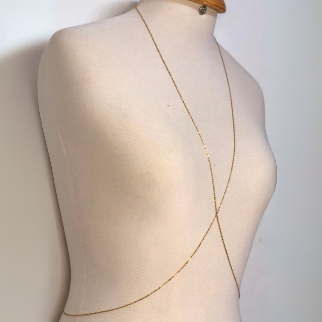Chaine de corps x en acier inoxydable — vue 2. Artisanat Tunisie.