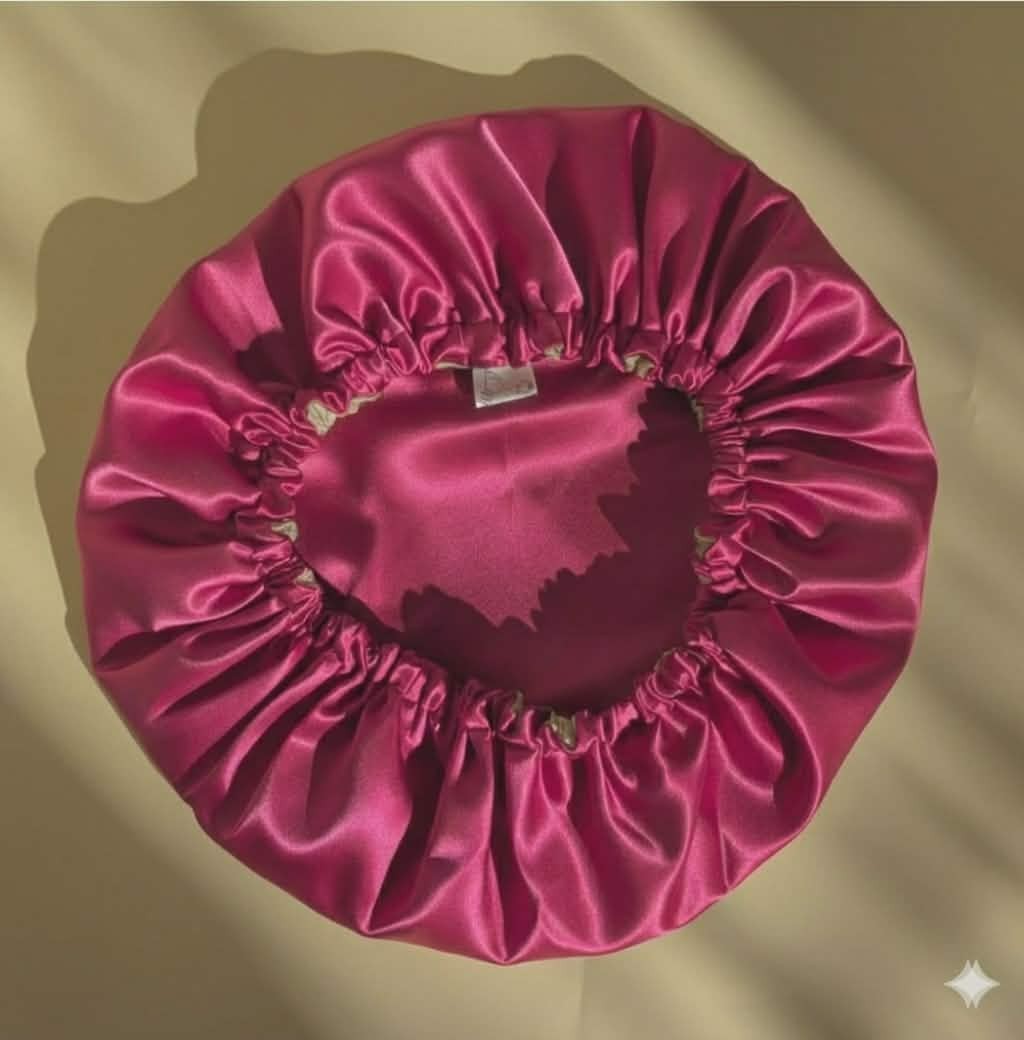 bonnet satin rose fushia réversible pour protéger vos cheveux
