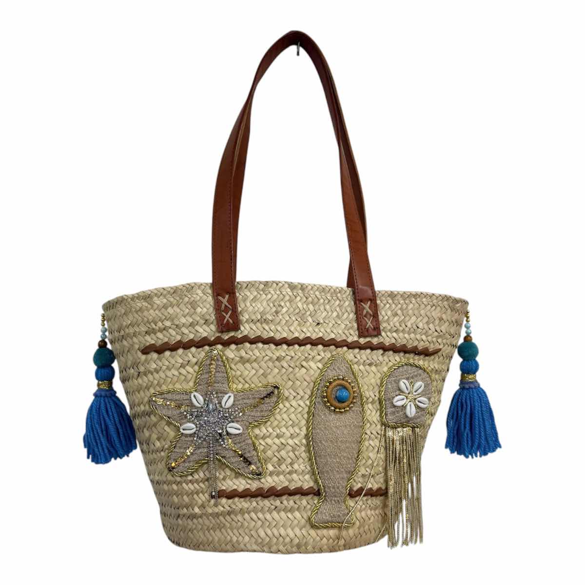 Couffin plage en paille chic avec anses cuir et pompons bleus