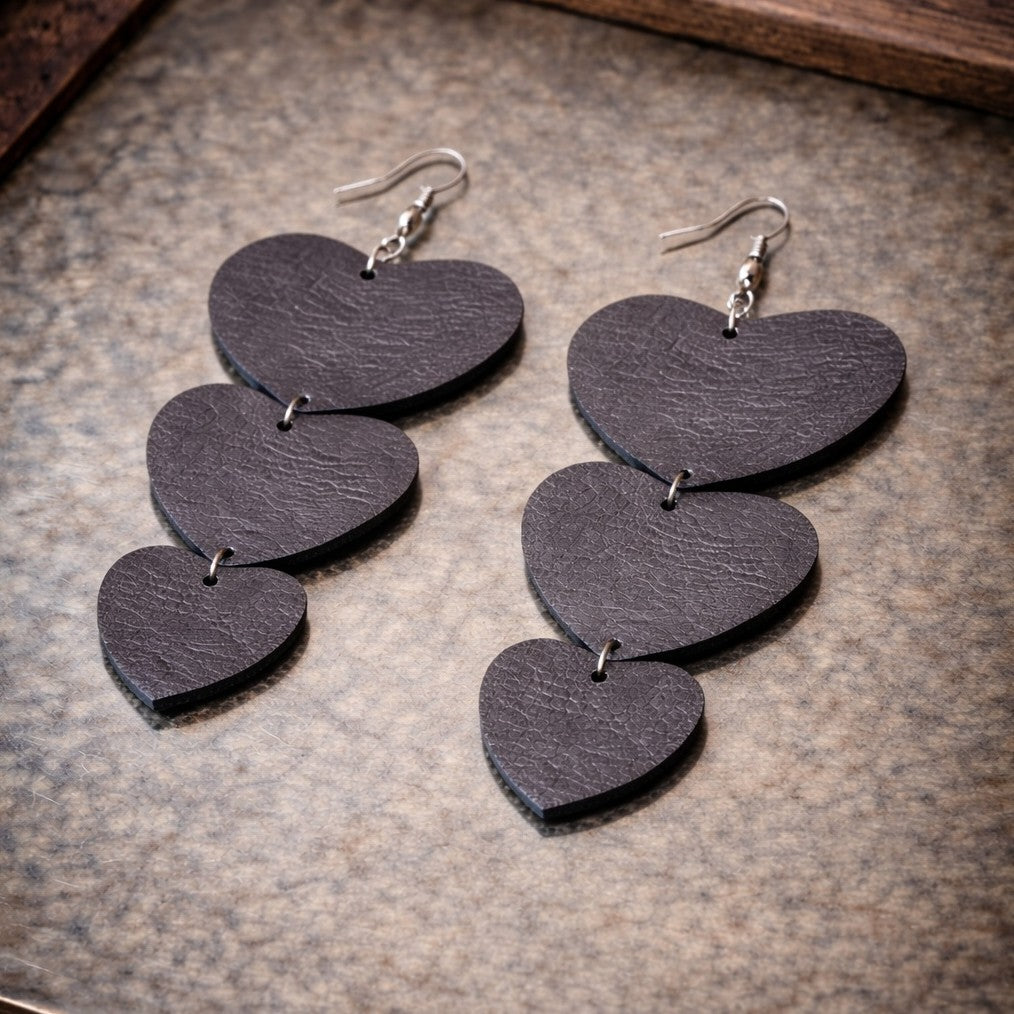Boucles d'oreilles cuir gris métallisé pour un style unique
