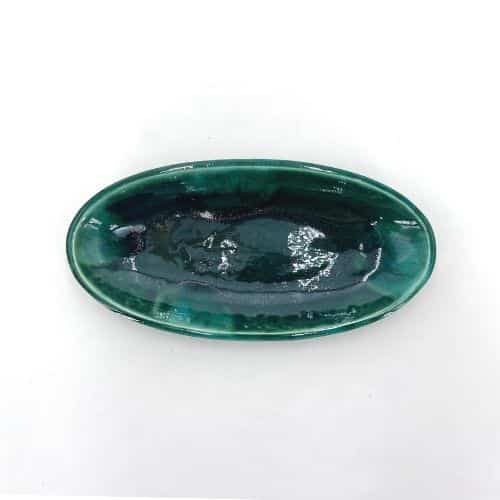 Plat ovale vert en céramique pour fruits secs