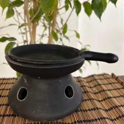 Black ceramic fondue pan