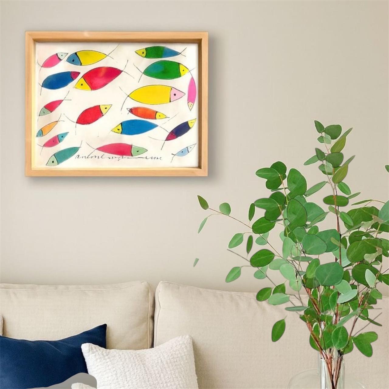 Tableau poissons colorés stylisés avec cadre en bois