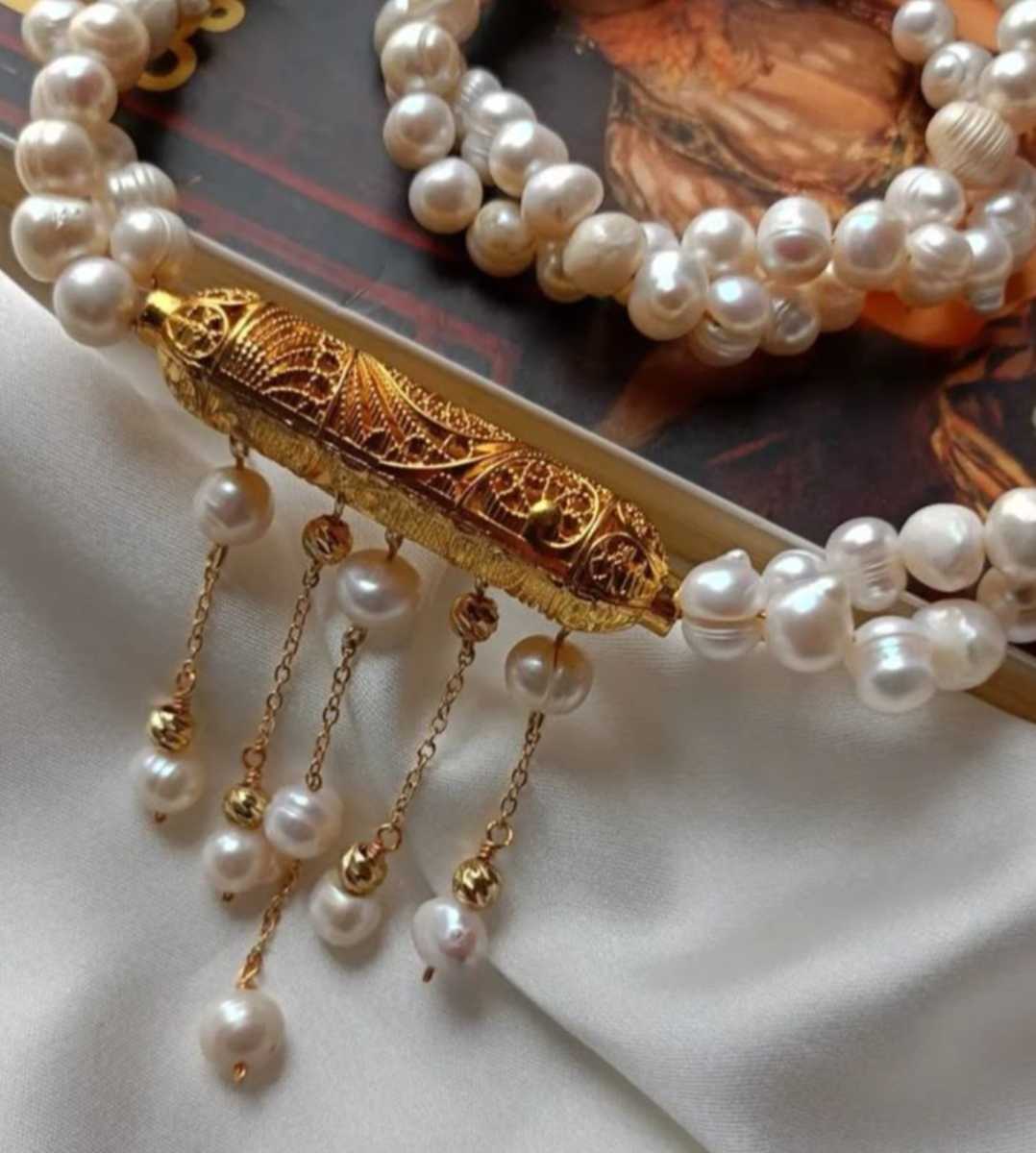 collier perle en cuivre doré 24k pour une élégance unique
