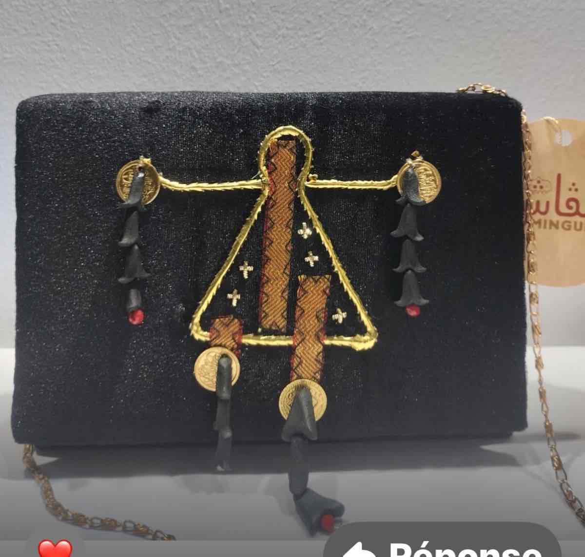 Pochette en velours noir et ambre
