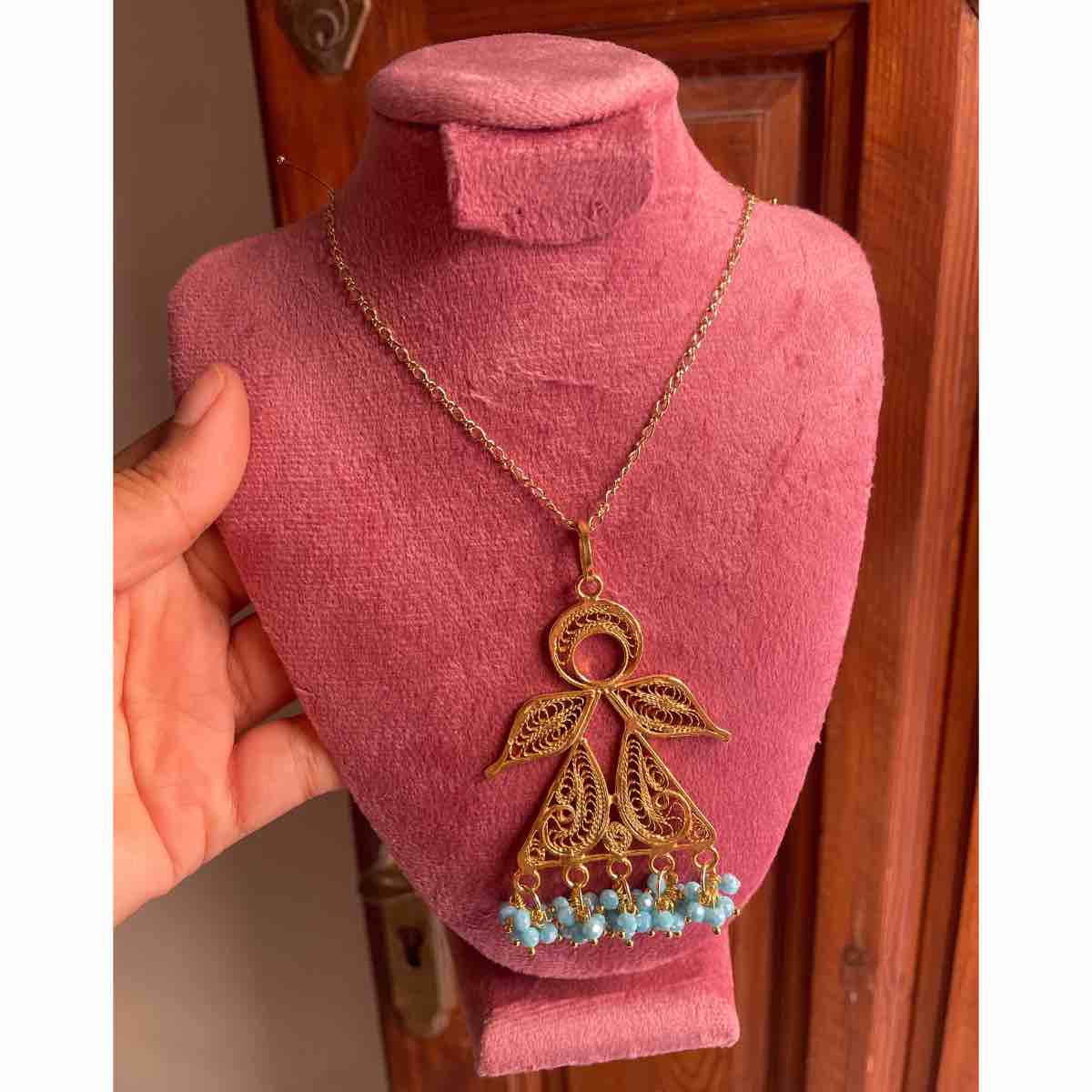 Collier filigrane Tanit l'élégance artisanale irrésistible