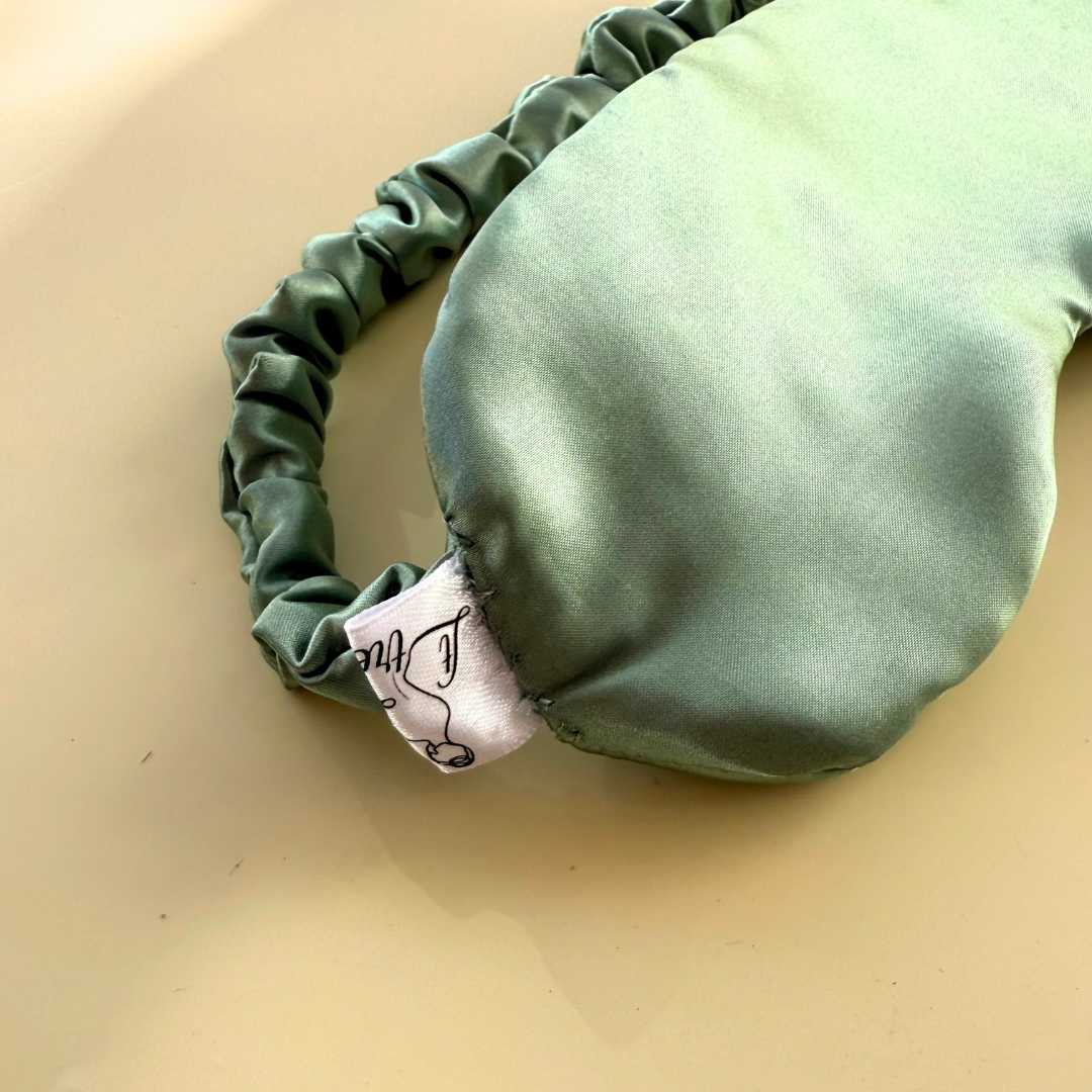 masque de sommeil luxe vert d'eau pour des nuits paisibles
