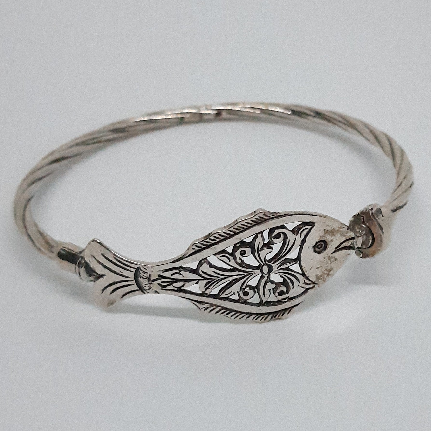 Finely engraved fish bracelet for women