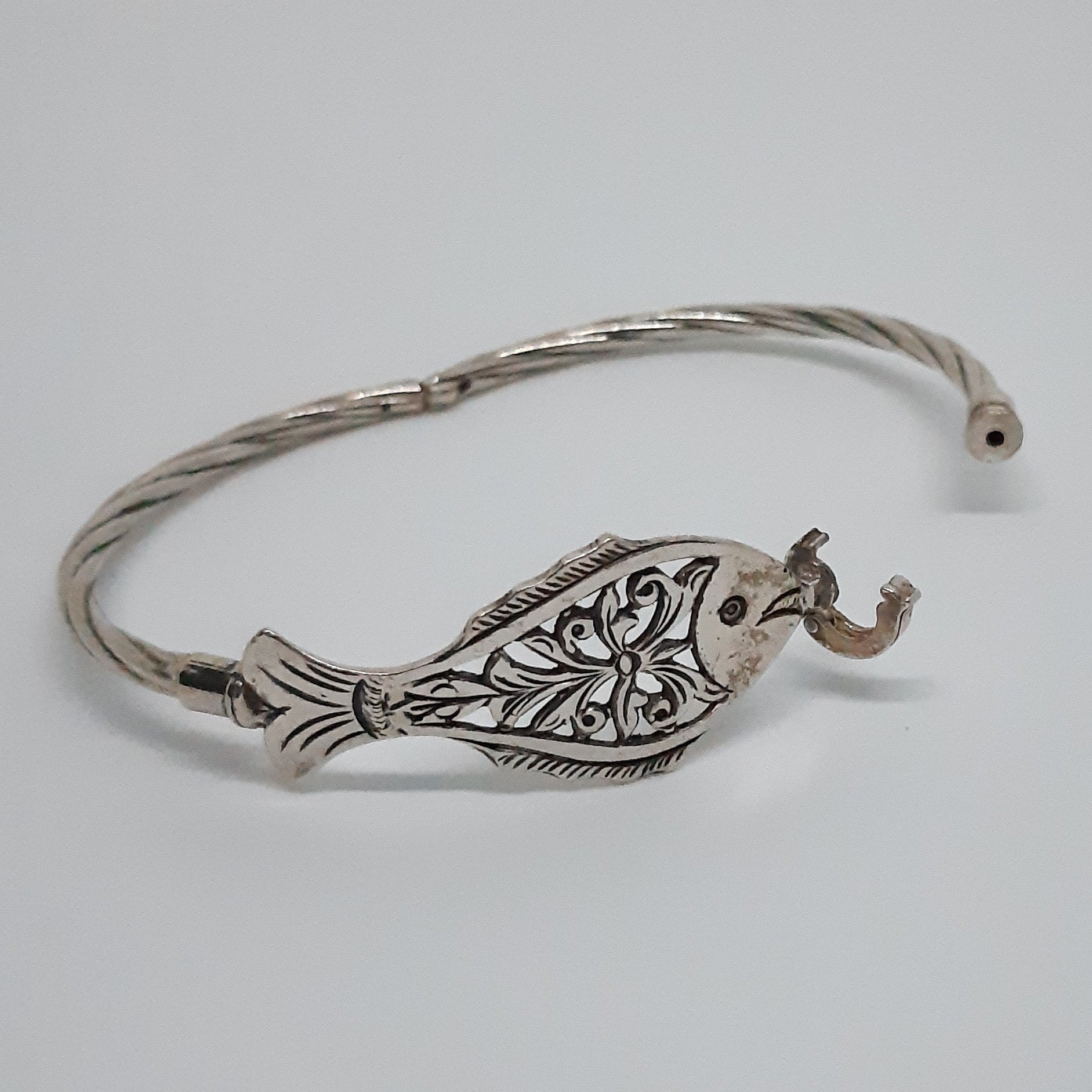 Finely engraved fish bracelet for women