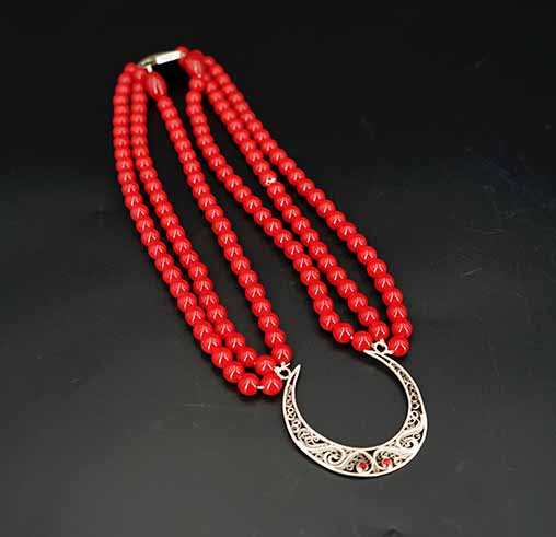 Handmade filigree silver necklace with fine hinge and red cubic zirconia